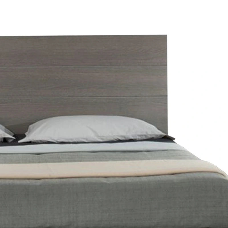 King Size Platform Bed with Black Metal Legs and Gray Panel Headboard